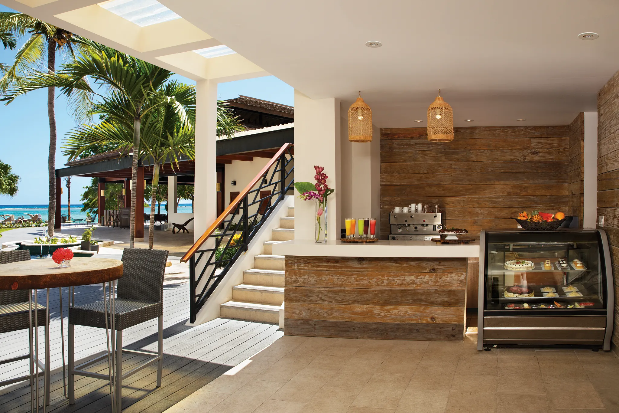Coco Café at Zoëtry Montego Bay Jamaica featuring an open-air coffee bar with ocean views, premium coffee drinks, and fresh pastries.