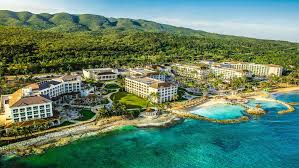 Hyatt Zilara Rose Hall adults-only all-inclusive resort with expansive pools, beachfront views, and lively atmosphere in Montego Bay Jamaica.