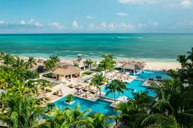 Iberostar Grand Rose Hall adults-only all-inclusive resort in Jamaica with oceanfront pools, elegant grounds, and upscale amenities.
