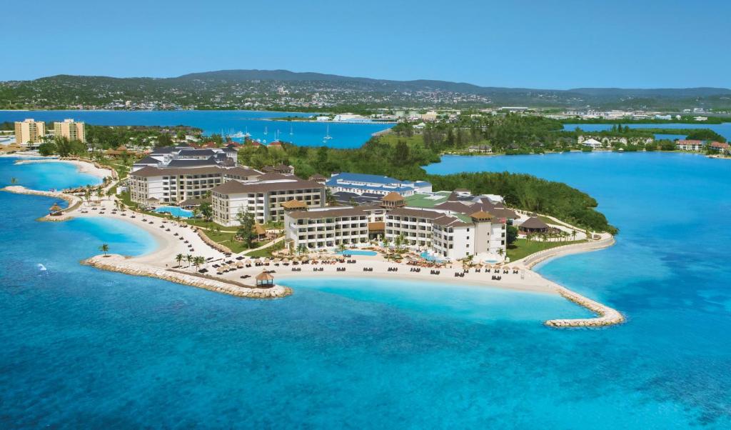 Secrets St. James Montego Bay adults-only all-inclusive resort with oceanfront pools, elegant suites, and romantic Caribbean setting.