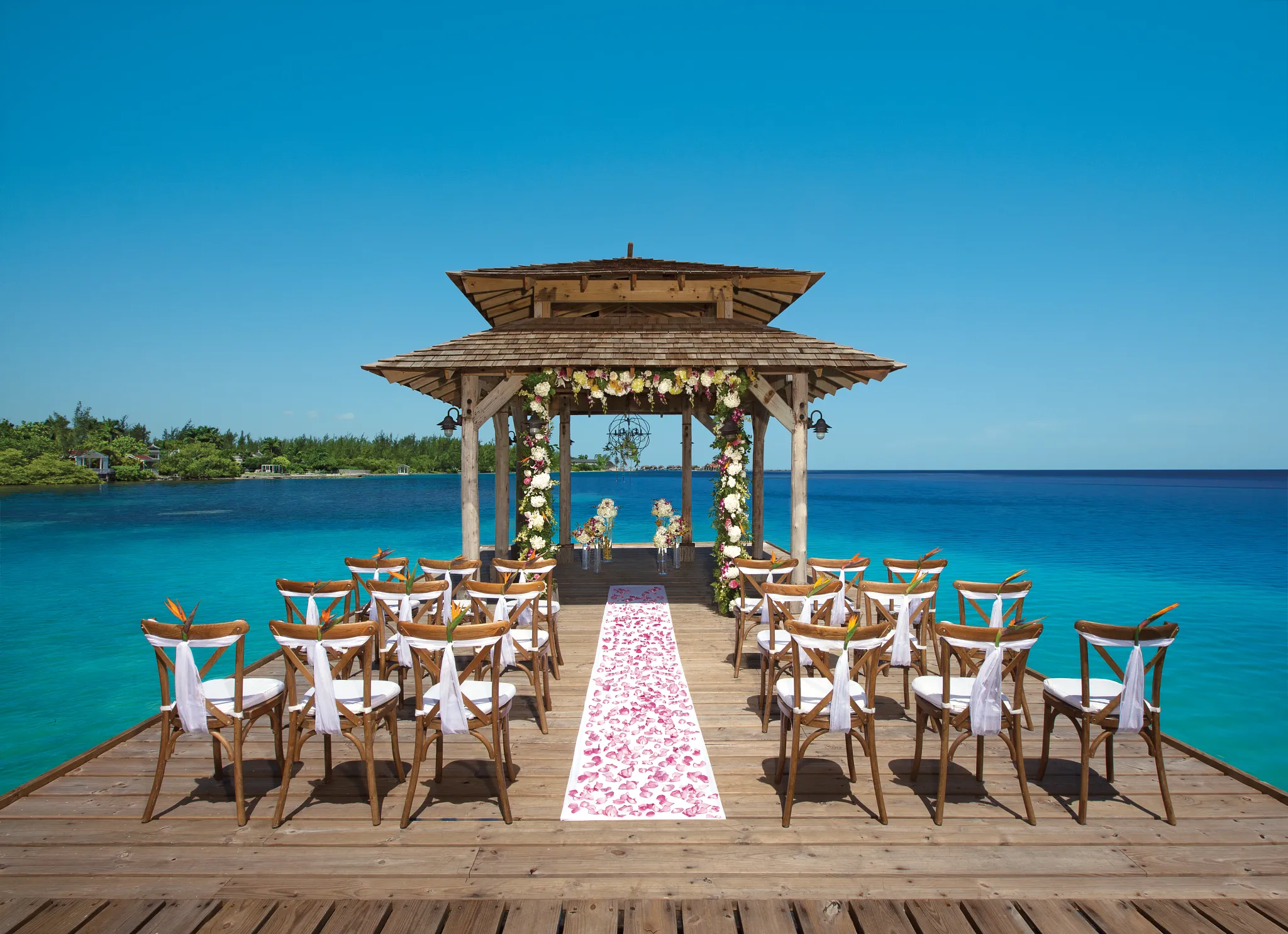 Overwater wedding gazebo decorated with florals at Zoëtry Montego Bay Jamaica