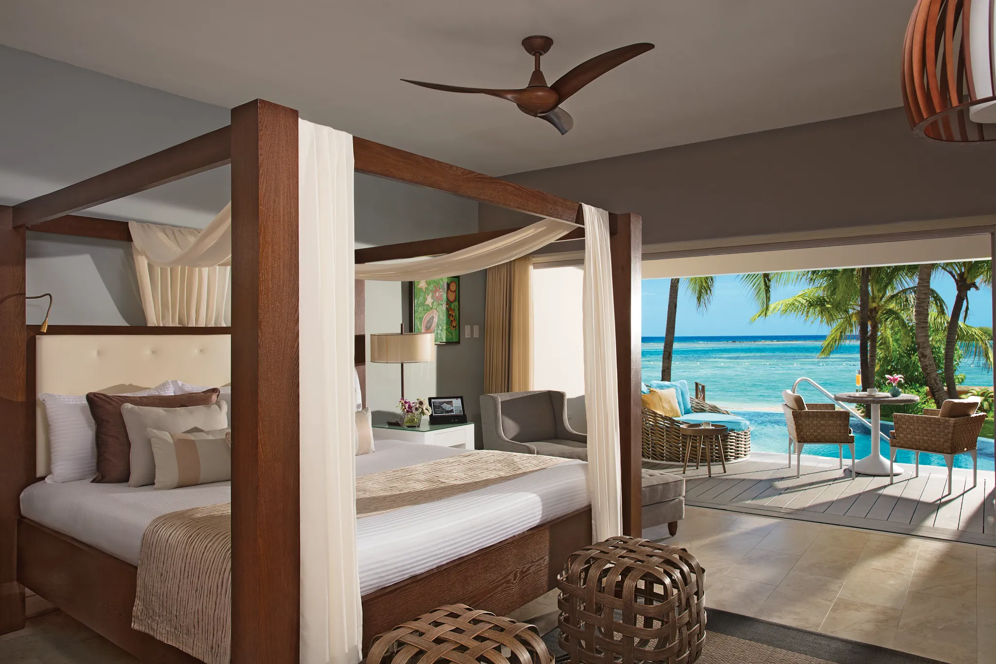 Junior Suite Swim Out Ocean View with king bed and direct pool access at Zoëtry Montego Bay Jamaica.
