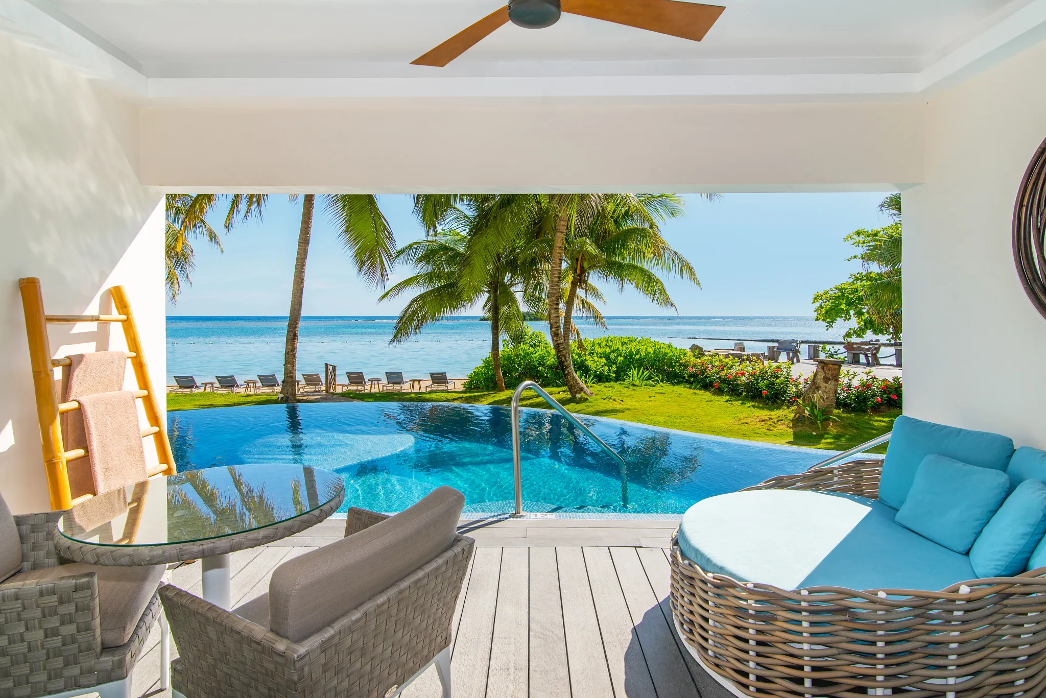 Private terrace with swim-out pool and ocean view at Junior Suite Swim Out Ocean View Zoëtry Montego Bay.