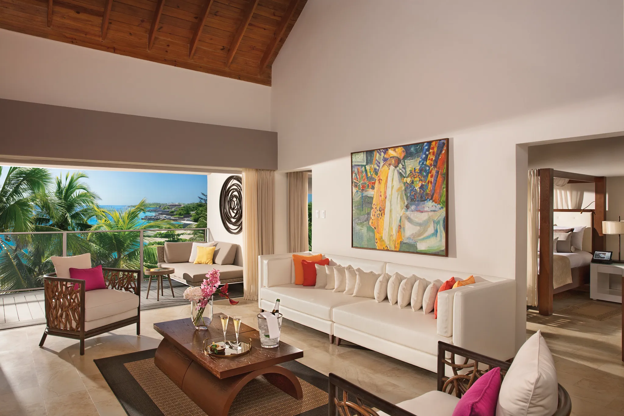 Master Suite Ocean View living area with sofa and oceanfront balcony at Zoëtry Montego Bay Jamaica.